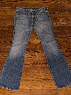 7 For All Mankind Women's Faded Blue Flare Jeans Size 28 - fits more like 27